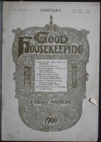 The words “Good Housekeeping” are centred at the top of an oval shape of vines. There is a white square in the centre that has text. “A Family Magazine” and “1900” are centred toward the bottom.  