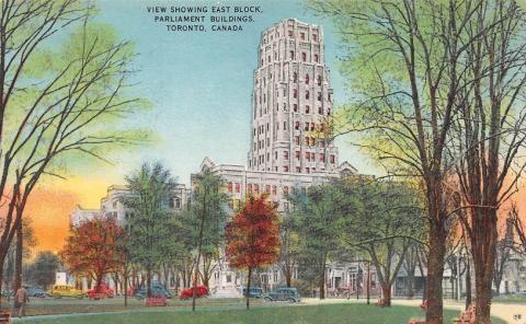 Postcard of the Parliament Building in Toronto. A large building is towering above trees and colourful cars. 